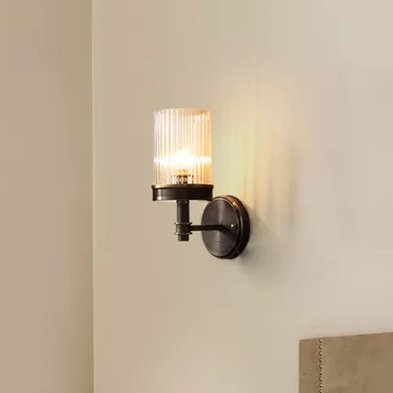 1-Light Wall Mounted Lamp Traditional Cylinder Transparent Glass Sconce Light in Brown/Gold over Bed