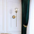 Ball Shade Pencil-Arm Wall Lighting Postmodern Clear/Amber/Smoke Grey Glass Single Brass Wall Mounted Lamp