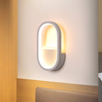 Oval Wall Light Fixture Contemporary Acrylic Black/White LED Wall Sconce in Warm/White Light