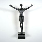 Climbing wall hanging statues