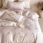 Satin bedding set with luxurious cotton satin quality, embroidered butterflies and roses, and ruffle