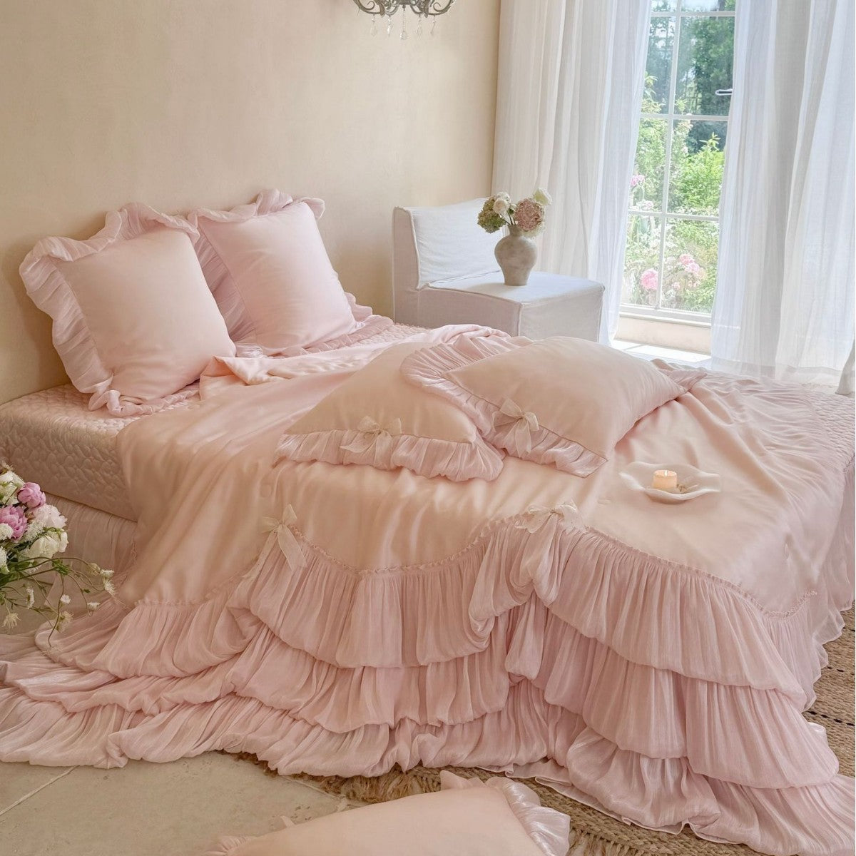Romantic satin bedding and bedspread set with decorative ruffles and bows