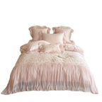 Luxurious romantic bedding set with ruffles, lace appliqué, and 3D floral embroidery