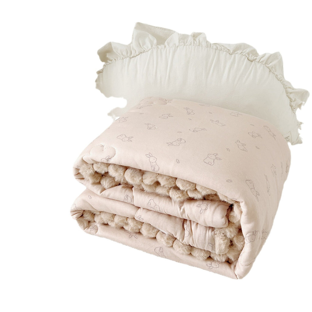 Cuddle blanket baby quilt with plush lining and bunny motif