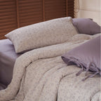 Reversible bed linen set made of cotton satin with floral print and ties