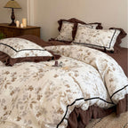 Floral cotton bedding set with ruffles and fine piping