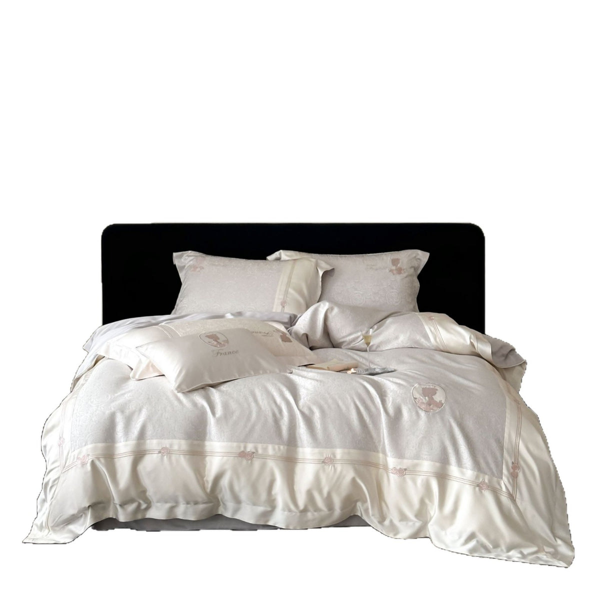 Luxurious cotton satin bed linen set with jacquard rose pattern and embroidered silhouette applications