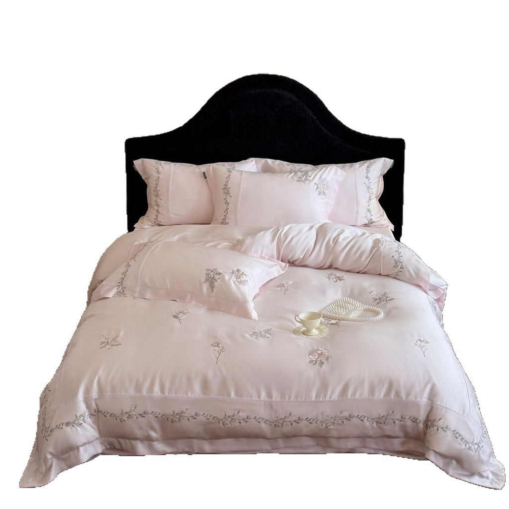 Elegant satin bedding set with fine floral embroidery and silky shiny drape