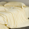Silky-smooth cotton satin bedding set with fine decorative ribbon and pillowcases