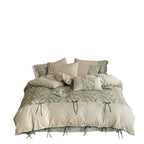 Embroidered cotton percale bedding set with quilted decorative plate and decorative ribbons
