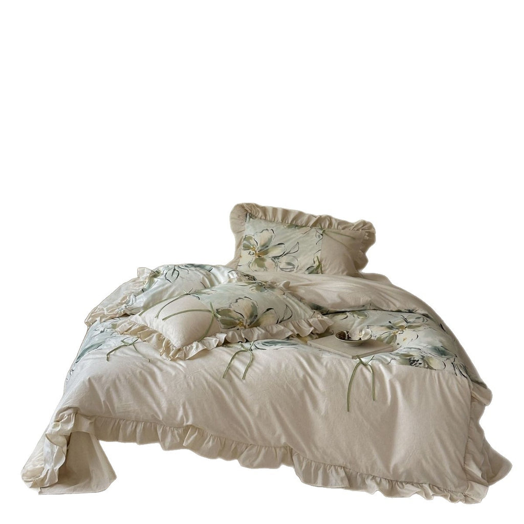 Duvet cover set made of cotton satin with watercolor magnolia print, ruffle, and tie ribbons