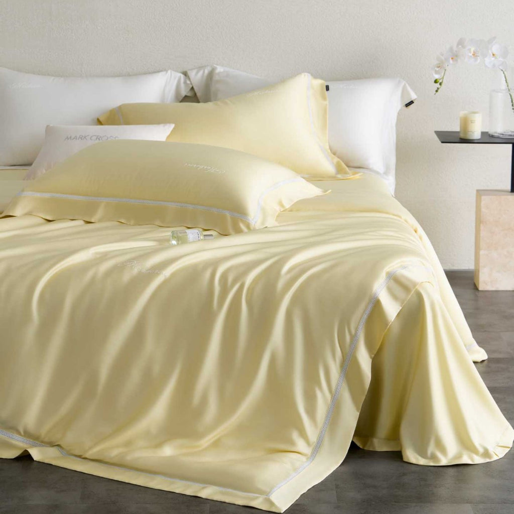 Silky-smooth cotton satin bedding set with fine decorative ribbon and pillowcases