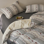Breathable bedding set made of cotton muslin with striped and rose jacquard