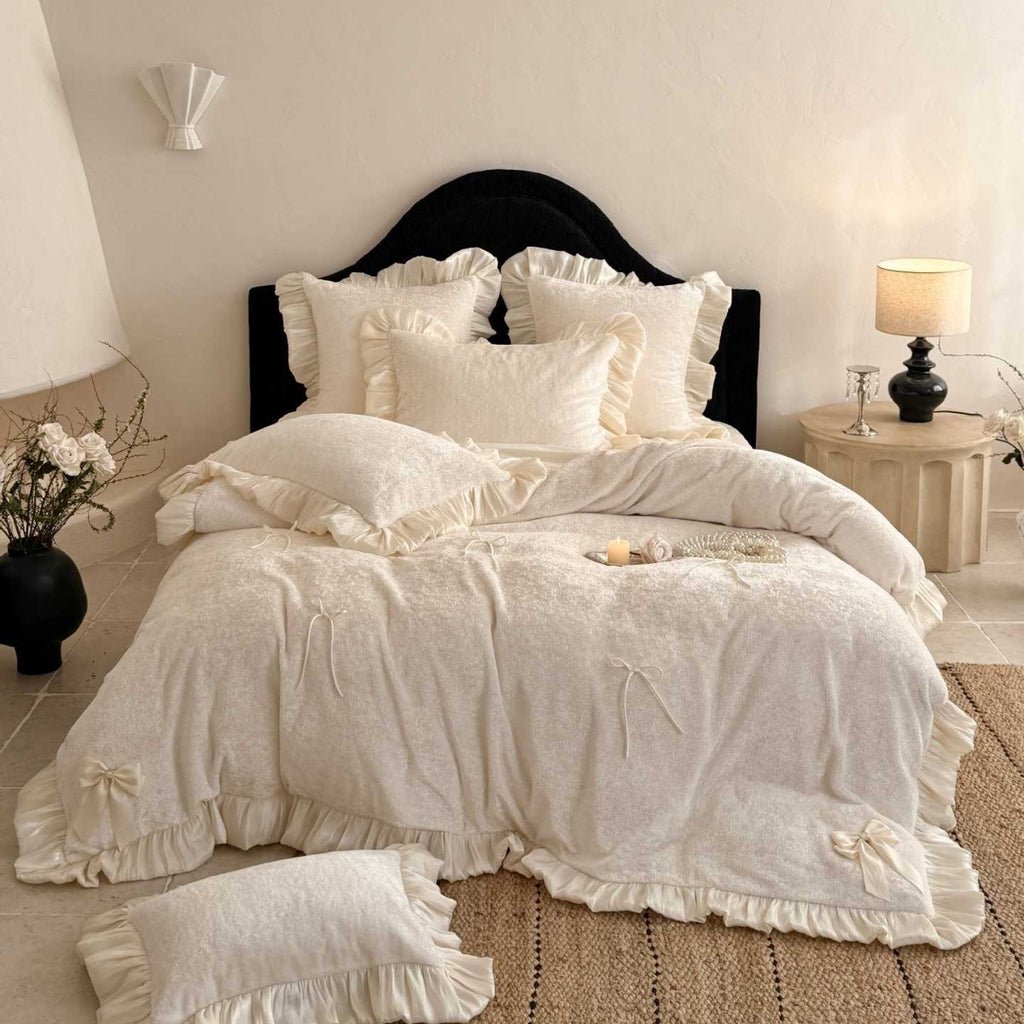 Romantic ruffle bedding set with bow appliqués and soft touch
