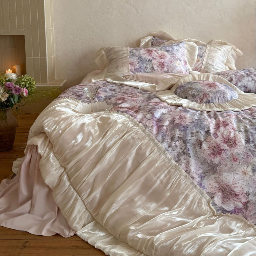 Romantic satin bedding set with floral pattern, ruffle and round cushion