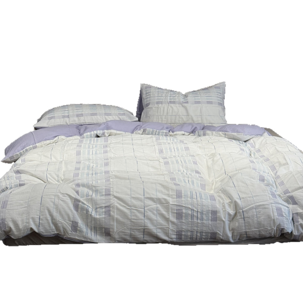 Cotton percale bedding set with a light quilted texture and subtle striped texture