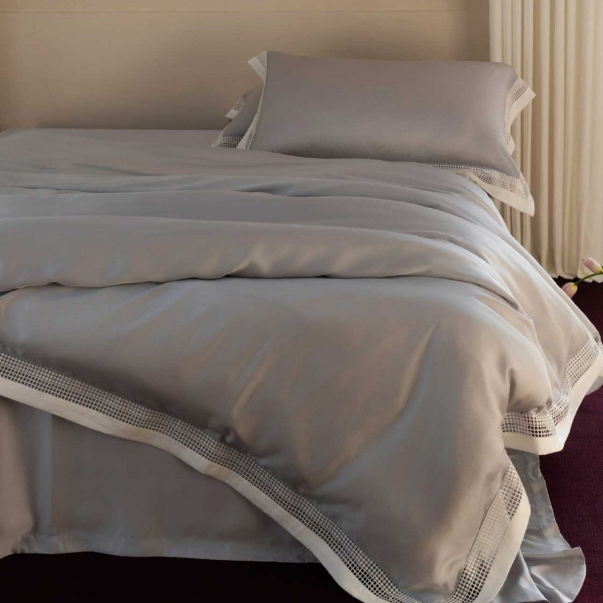 Luxurious bedding set made of cotton satin with lace border