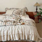 luxurious quilted bedspread set with embroidered lace and flounces