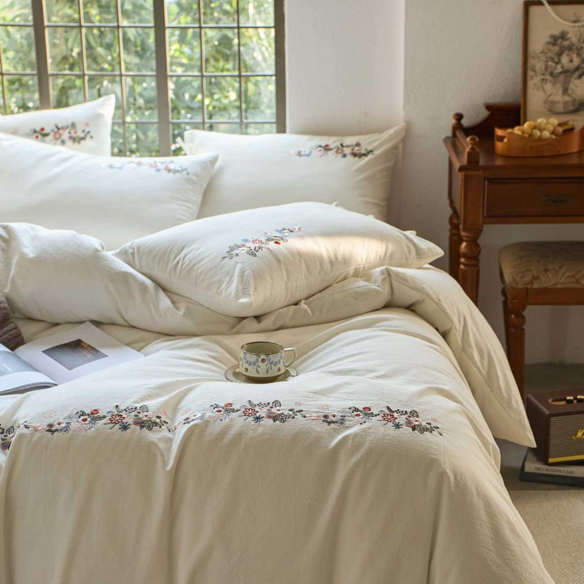 Embroidered cotton bedding set with floral border design and extra-soft percale quality