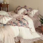 Bedding set with frill, floral watercolor print and tie ribbons
