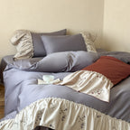 Elegant bedding set made of cotton satin with embroidered frill and reversible pillow
