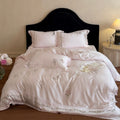 Elegant satin bedding set with fine floral embroidery and silky shiny drape