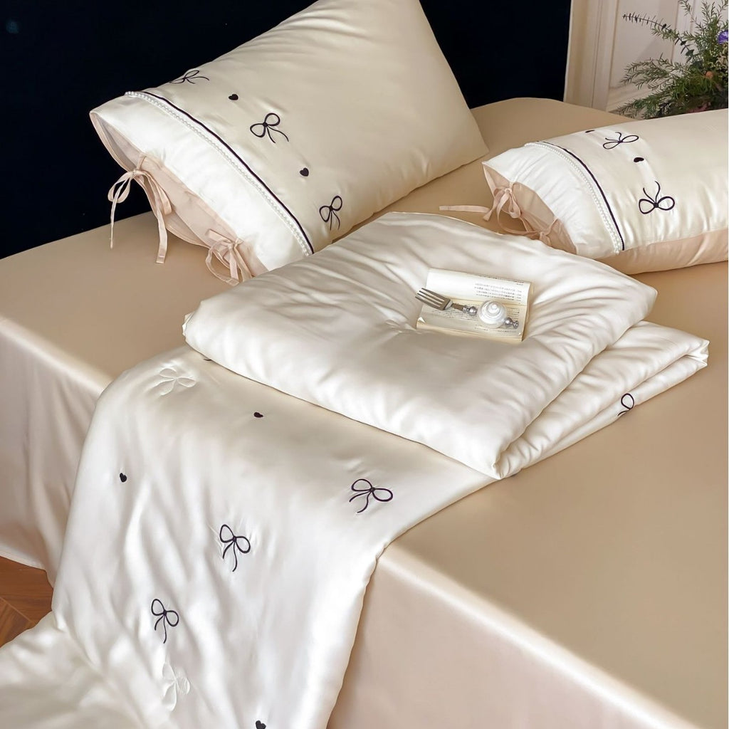 Fine silk look cotton satin bed linen set with delicate ribbon embroidery and ties