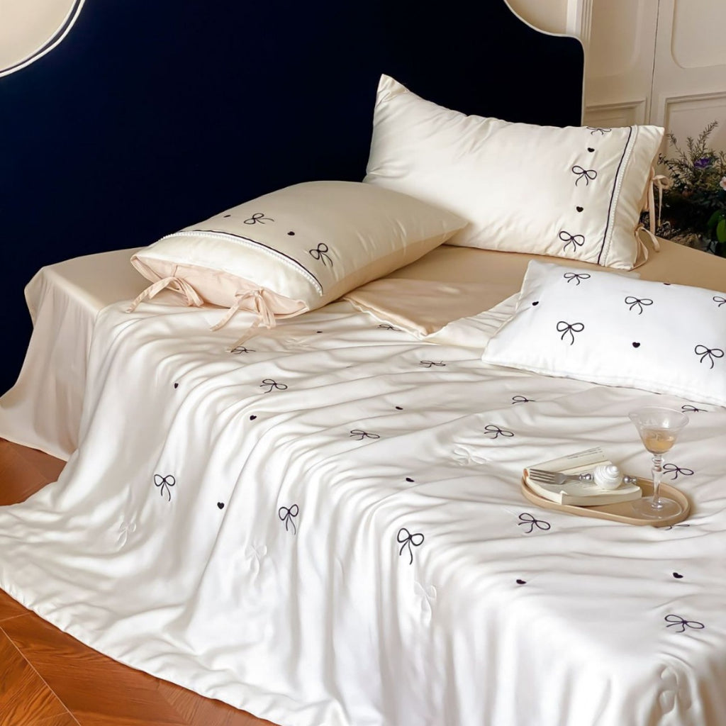 Fine silk look cotton satin bed linen set with delicate ribbon embroidery and ties