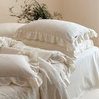 Quilted cotton-linen duvet cover set with subtle wrinkled texture and ruffle