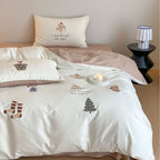 Playful cotton satin bedding set with illustrative print, reversible function, and hotel closure