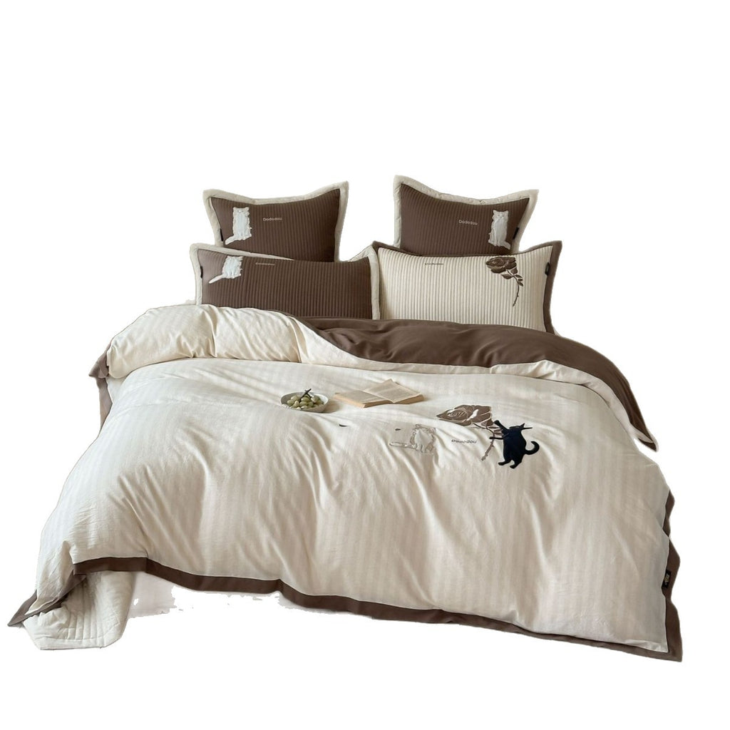 striped cotton bedding set with embroidered teddy bear appliqués and button closure