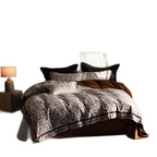 Reversible bedding set made of cotton satin with fine leaf pattern and contrasting piping