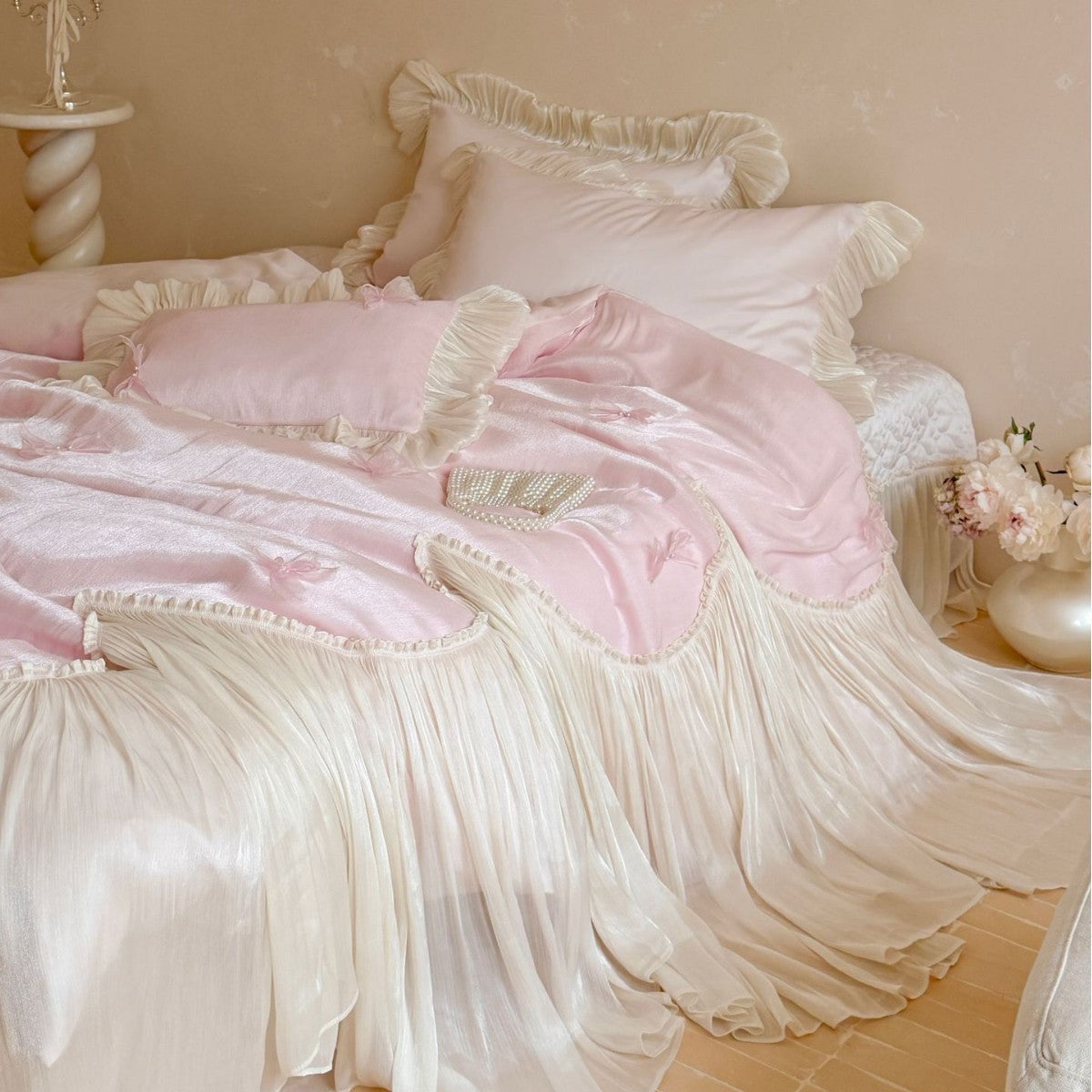 Luxurious satin bedding set with ruffles, pleated bed skirt and decorative pillow