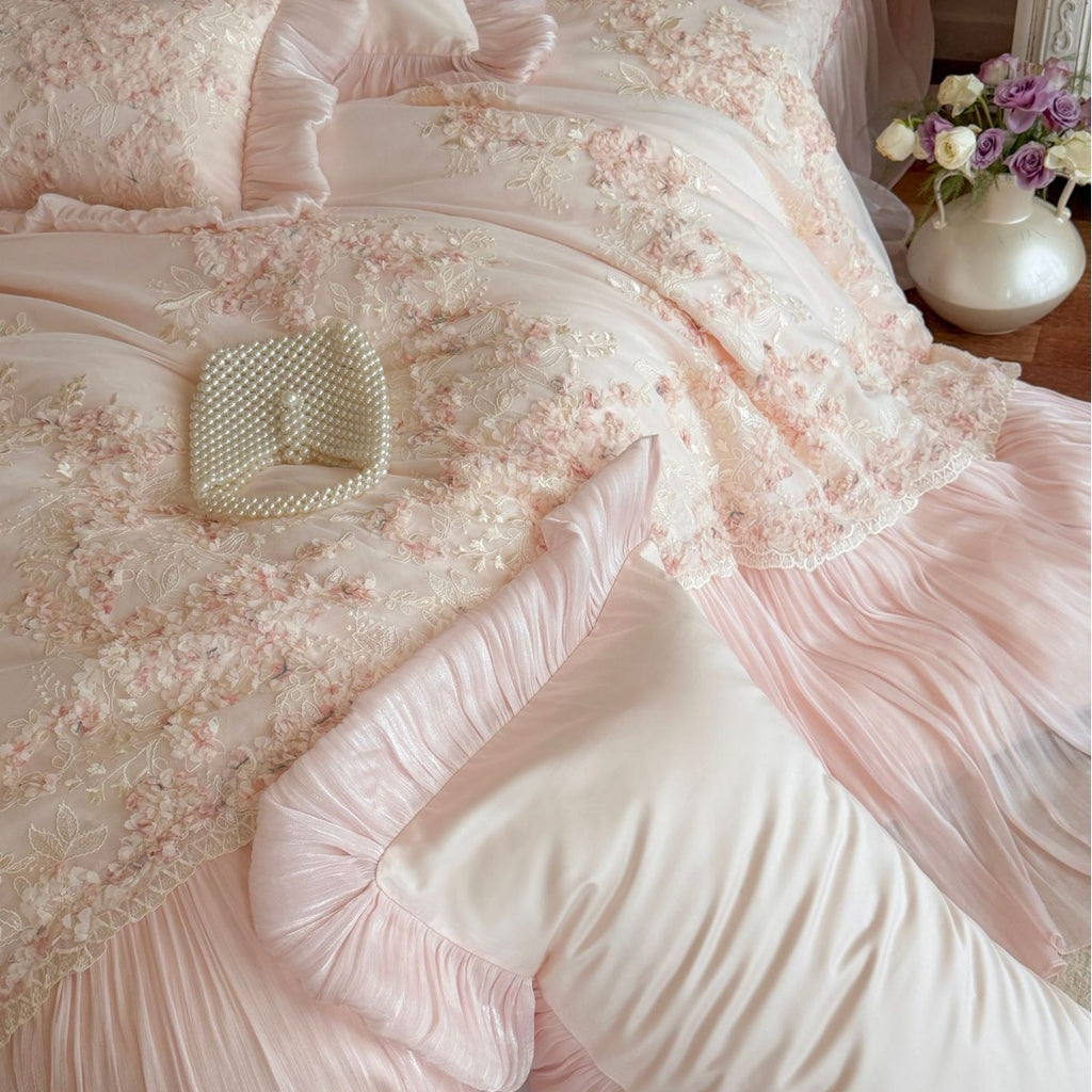 Luxurious romantic bedding set with ruffles, lace appliqué, and 3D floral embroidery