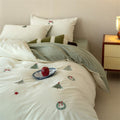 Reversible cotton bedding set with fine Christmas embroidery and satin finish reverse side