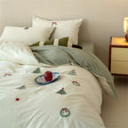 Reversible cotton bedding set with fine Christmas embroidery and satin finish reverse side