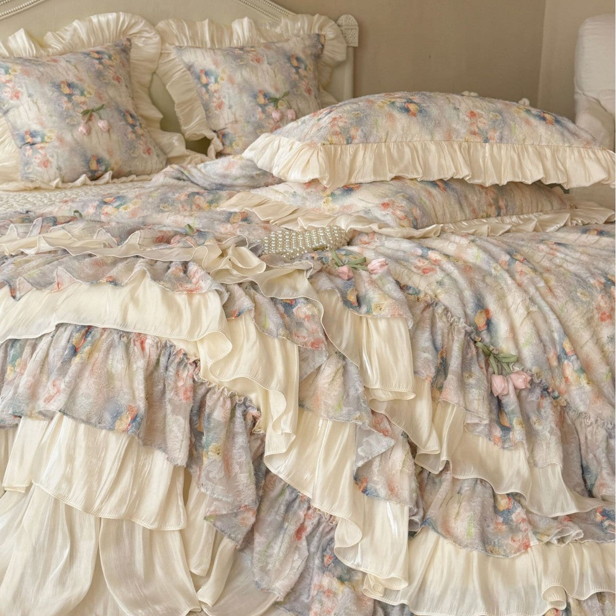 Romantic bedding set with layered ruffle, frills, and delicate watercolor flower print
