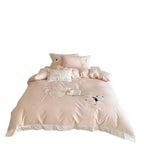 Romantic cotton bedding set with appliquéd heart balloons and plush motifs
