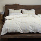 Cotton percale bedding set with a light quilted texture and subtle striped texture