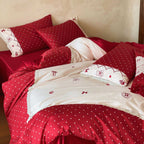Country house style bedding set with polka dot design, decorative trim and pillowcase set