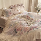 Satin bedding set with floral print, ruffles and lace trim