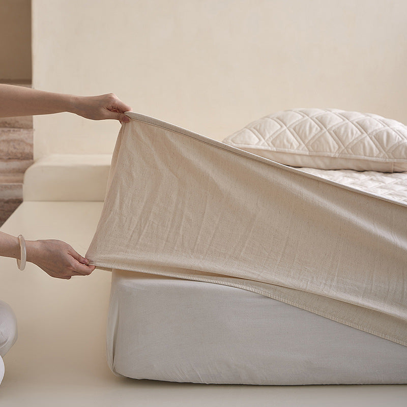 Quilted mattress protector with all-around elastic and breathable cotton filling