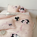 Bedding set with embroidered cat appliqués and soft cotton satin