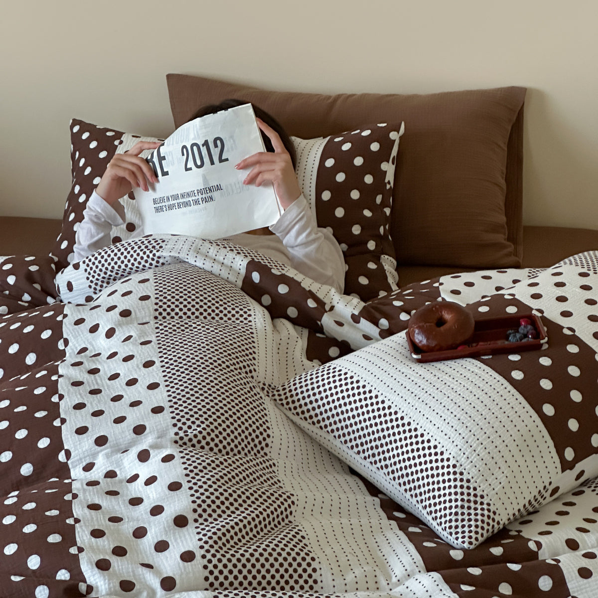 Reversible cotton percale bedding set with patched dot pattern and breathable quilted texture