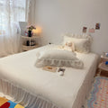 Quilted bedspread with ruffle and delicate floral quilting