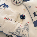 Maritime bedding set for children with embroidered sail and sea motifs made of cotton percale