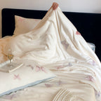 Elegant satin bedding set with embroidered butterfly details