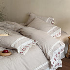 Linen bed linen set with embroidered lace borders