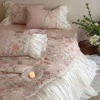 Bedding set with pleated frill, lace border, and floral print