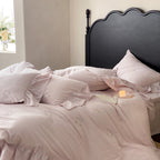 Vintage-inspired linen bedding set with fine rose embroidery and soft wash finish